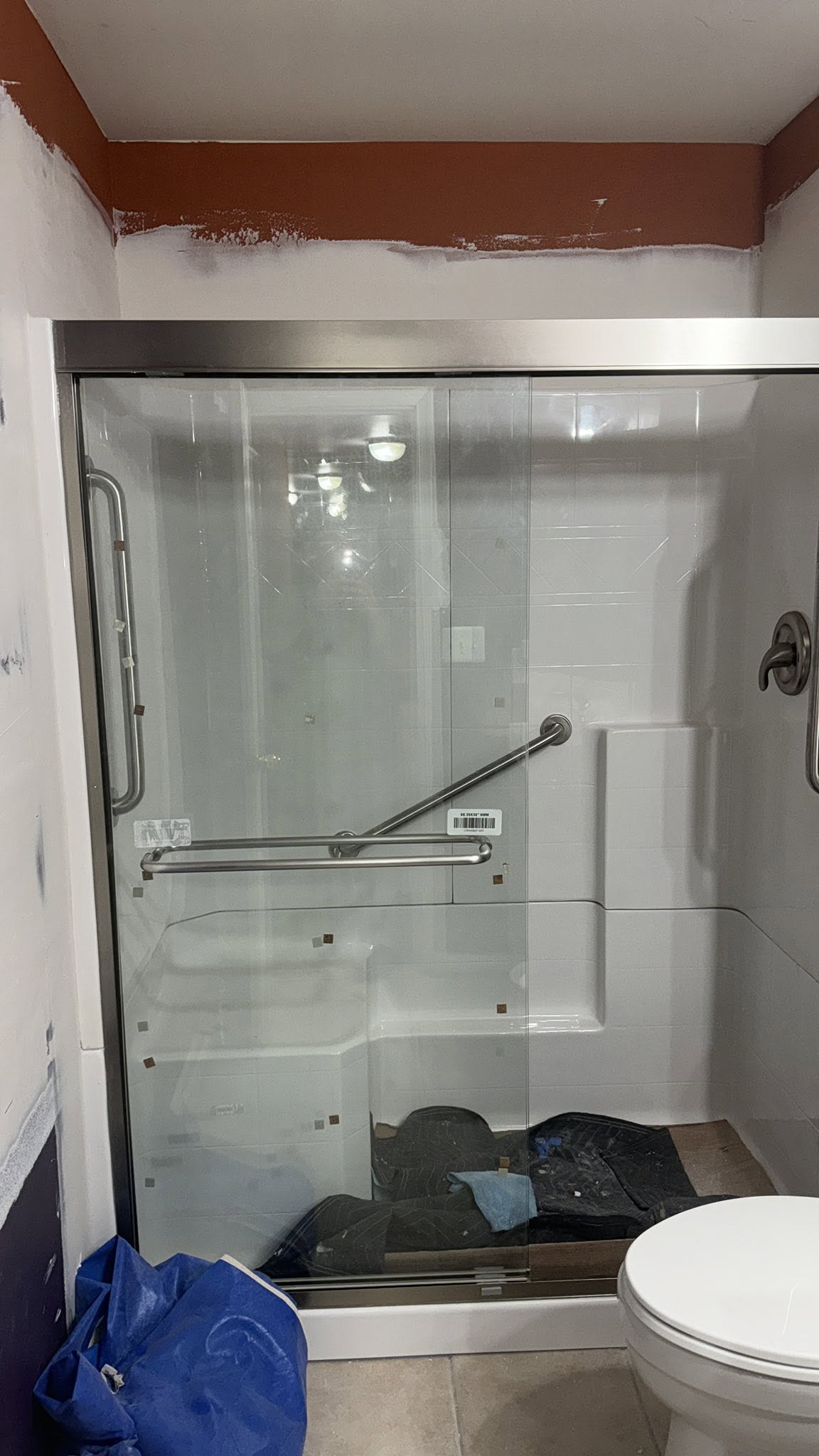 Bathroom · new shower with grab bar and glass doors
