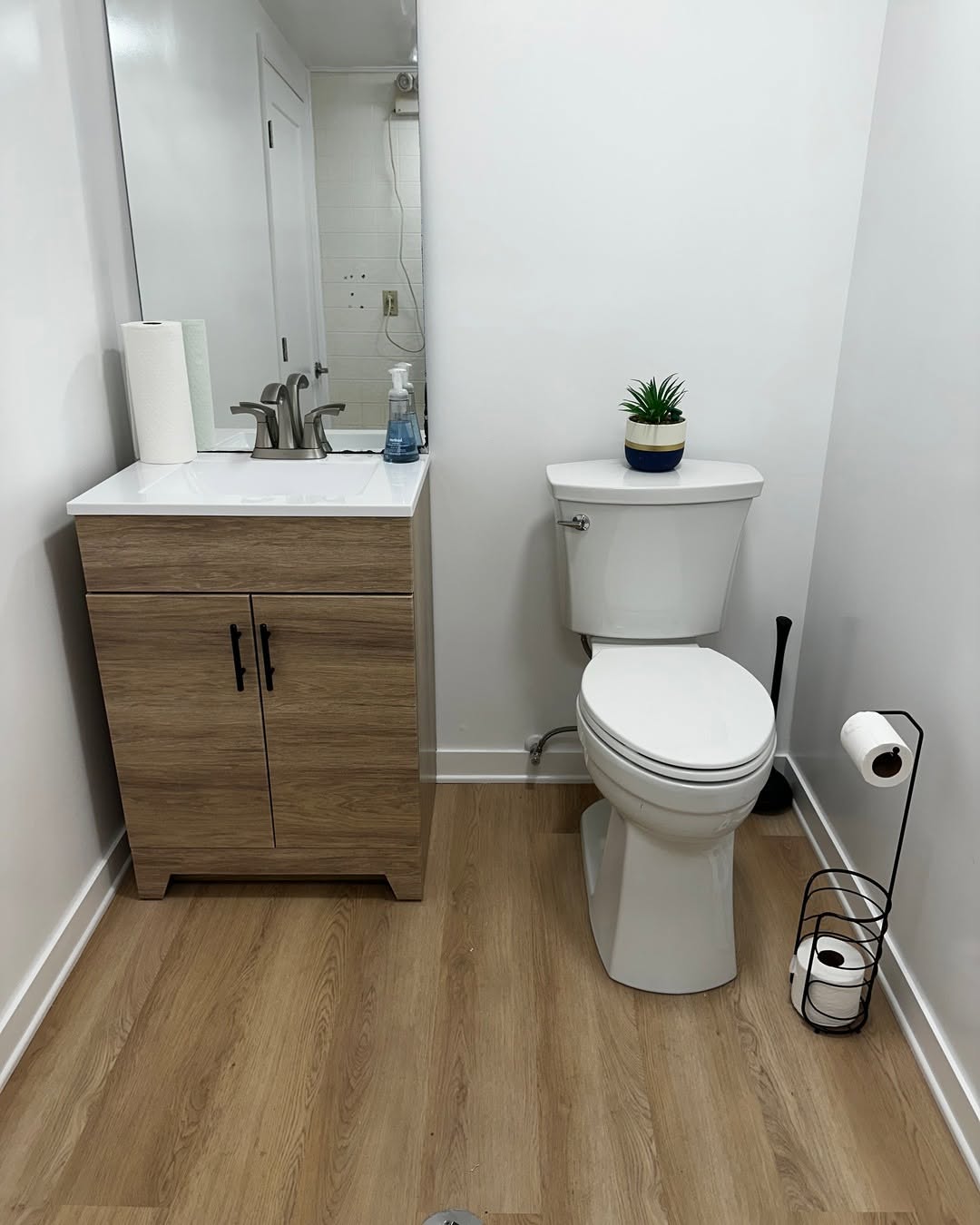Bathroom · new vanity and plank floor