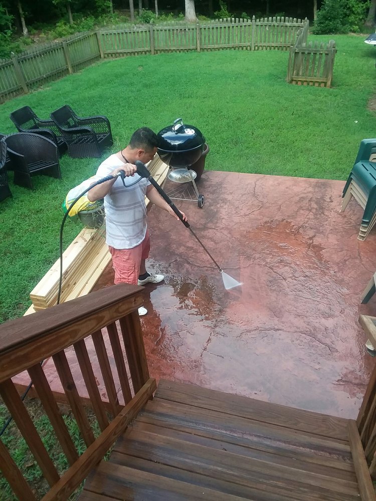 Patio · pressure-washing stamped concrete