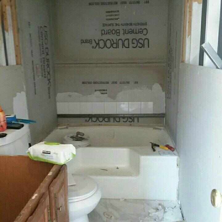 Before: tub surround in bare cement board